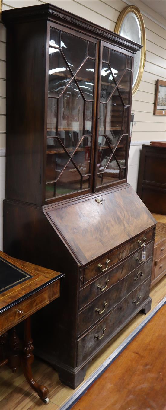 A George III mahogany bureau bookcase W.107cm